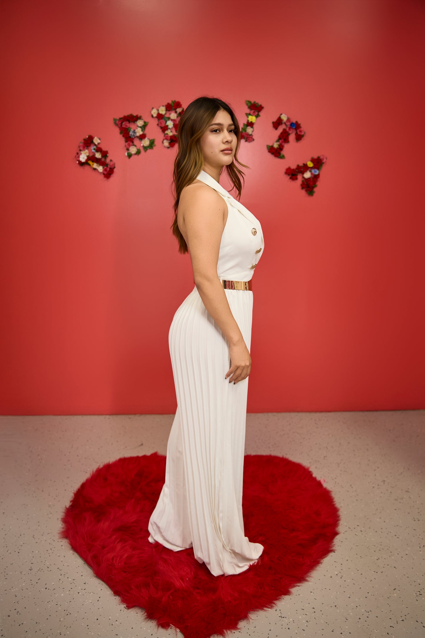White sleeveless jumpsuit with V-neckline