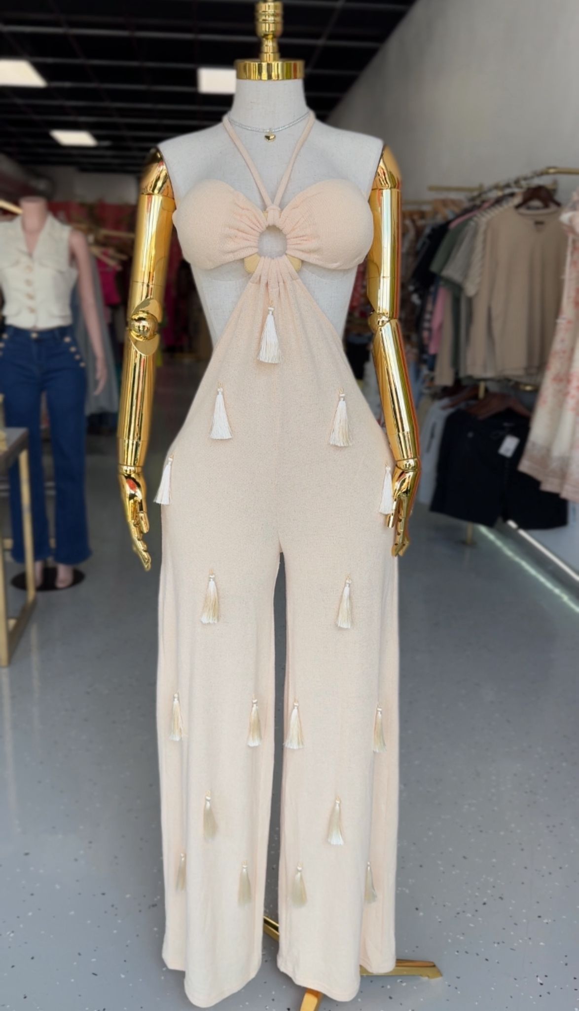 Black fitted jumpsuit with side cuts and neckline